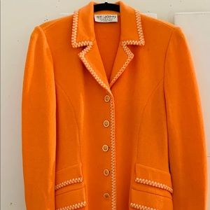 Beautiful St John Blazer, brand new , in beautiful, vibrant color.